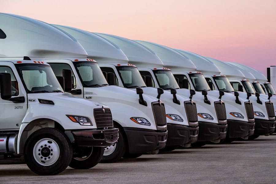 A row of white trucks
