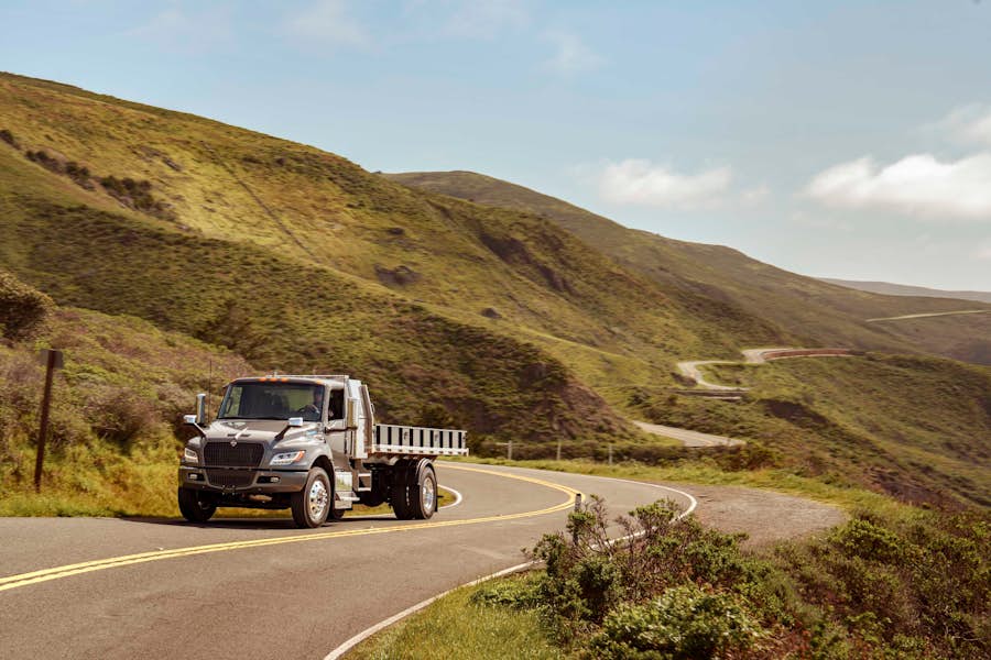 A truck driving on a winding road