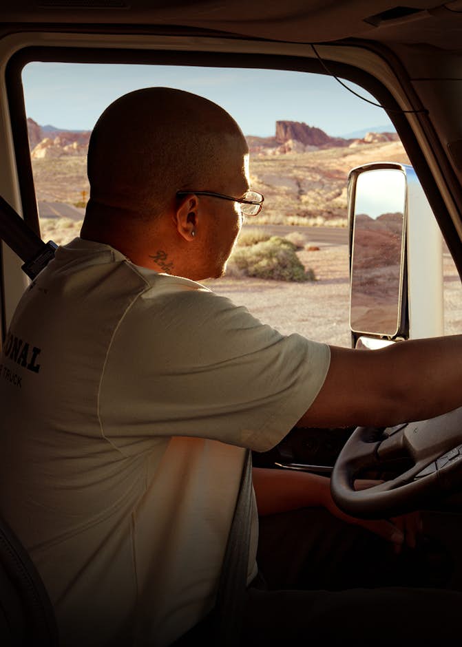 A person driving a truck