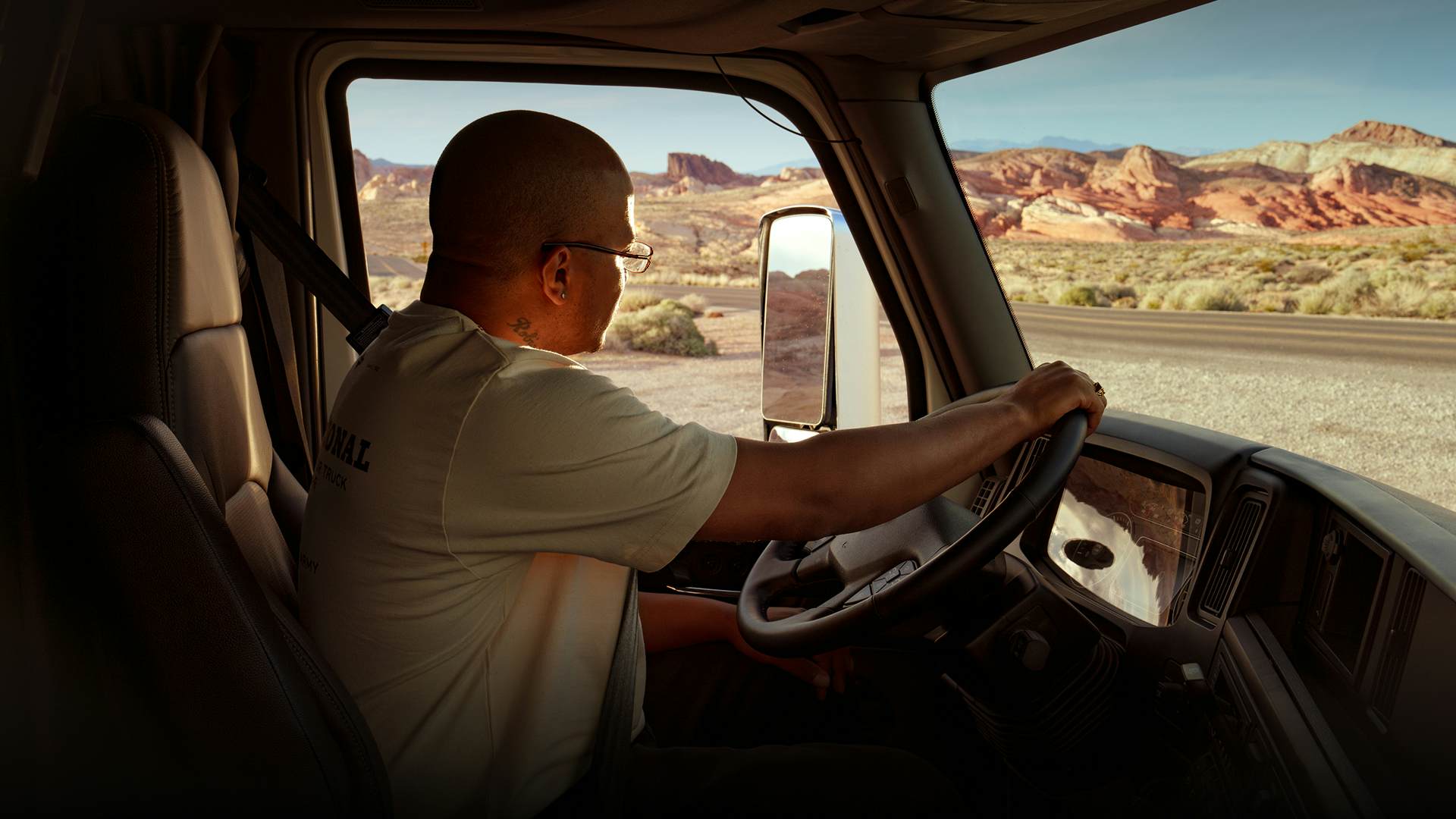 A person driving a truck